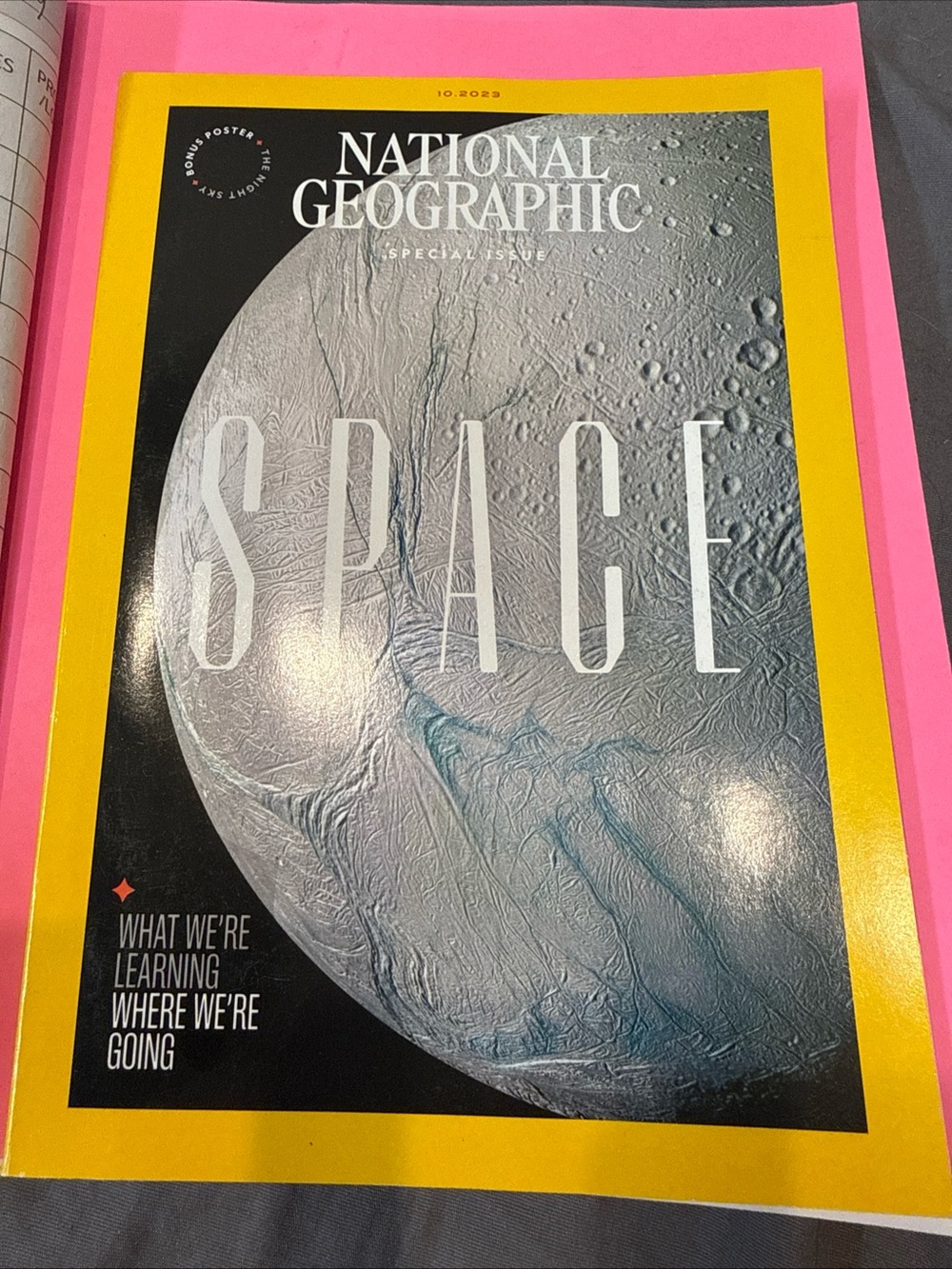 National Geographic Cover with Yellow Border and Pink Background
